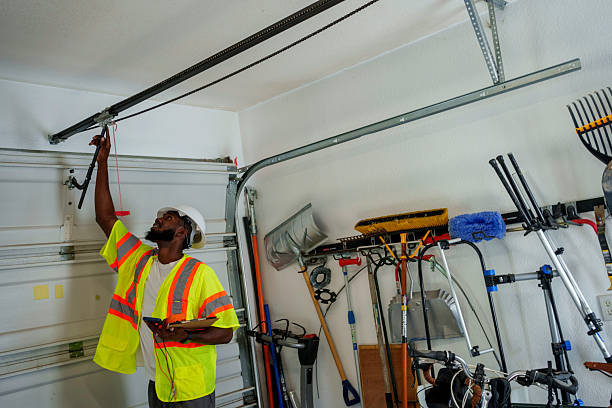 Professional Garage Door Panel Replacement technician working in Andrews, IN